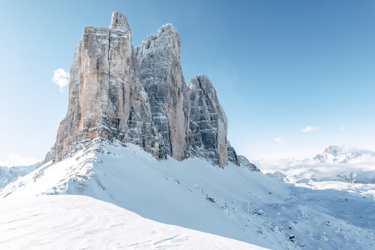 Services Breathtaking view of the snow-covered peaks in the Dolomites, Italy's winter wonderland.